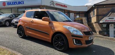 Suzuki Swift 1.2 SZ-L **WITH VERY LOW MILEAGE, ONE OF THE LAST £35 ROAD TAX CARS, 6 MAIN DEALER SERVICES CARRIED OUT AND 12 MONTHS PARTS AND LABOUR SUZUKI WARRANTY** Hatchback Petrol Orange at Suzuki UCL Milton Keynes